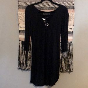 NWT L black form fitting mini dress